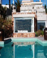 Add your one line caption using the Image tab of the Web Properties dialog