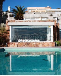 Add your one line caption using the Image tab of the Web Properties dialog